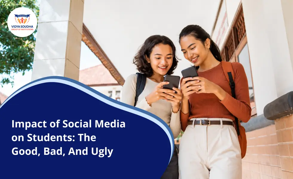 Two students checking social media on their phones